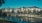 a body of water with buildings along it