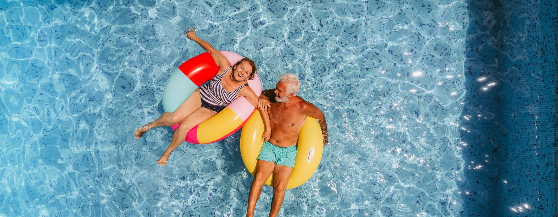 a man and woman in a pool