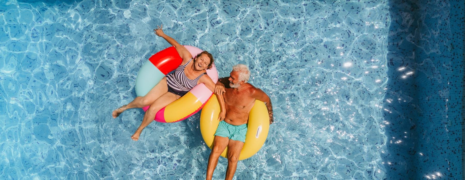 a man and woman in a pool